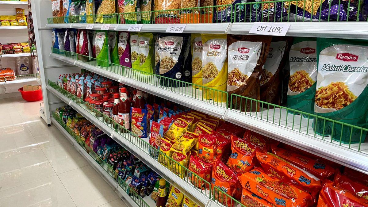Inside a Grocery Select store: wide aisles and fresh produce